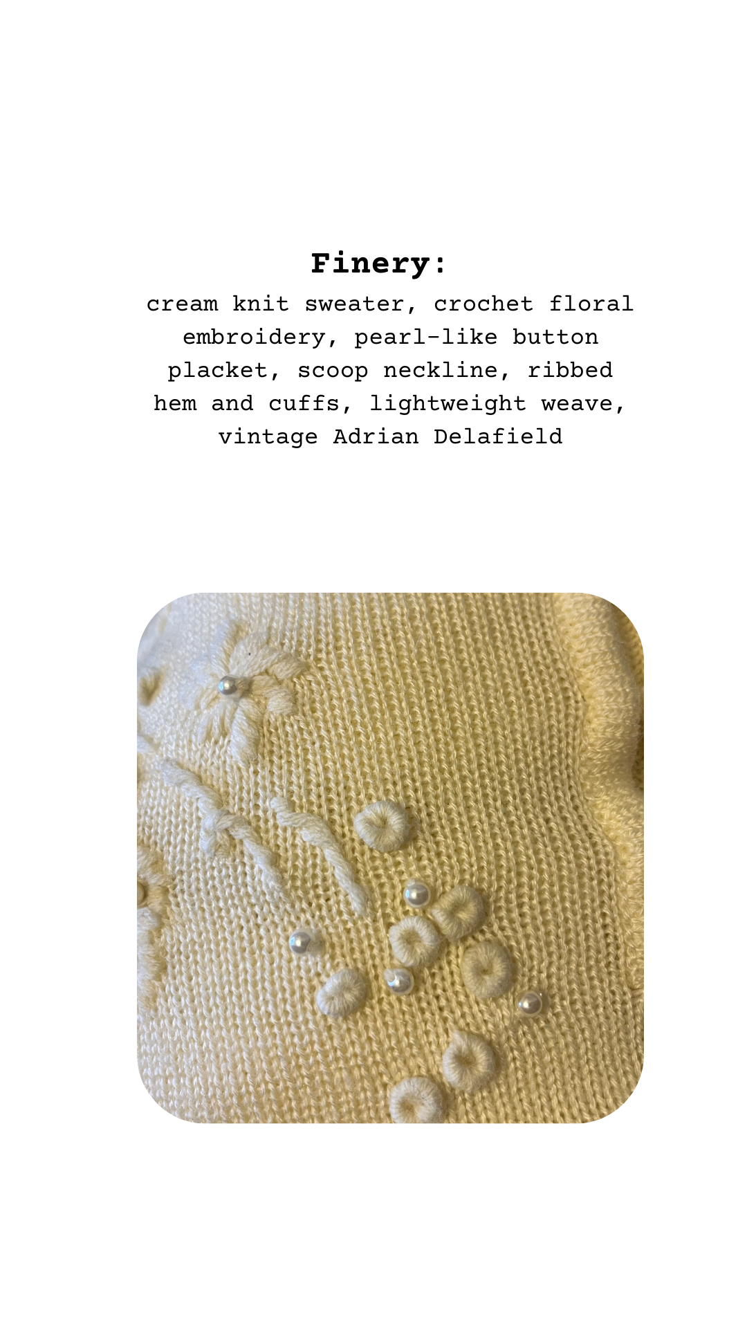 Close-up of a cream knit sweater with crochet floral embroidery and pearl-like buttons on a white background.