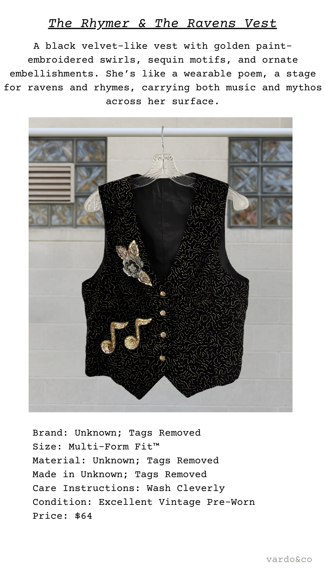 Black velvet vest with gold paint embroidery on a hanger against a white background