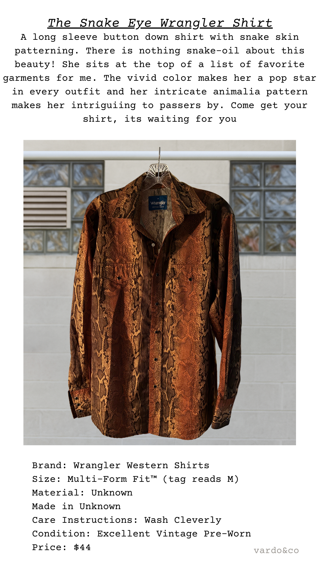 The Snake Eye Wrangler Shirt shown on hanger, copper-brown snake pattern with pearlized snap buttons and pointed yoke detailing visible.
