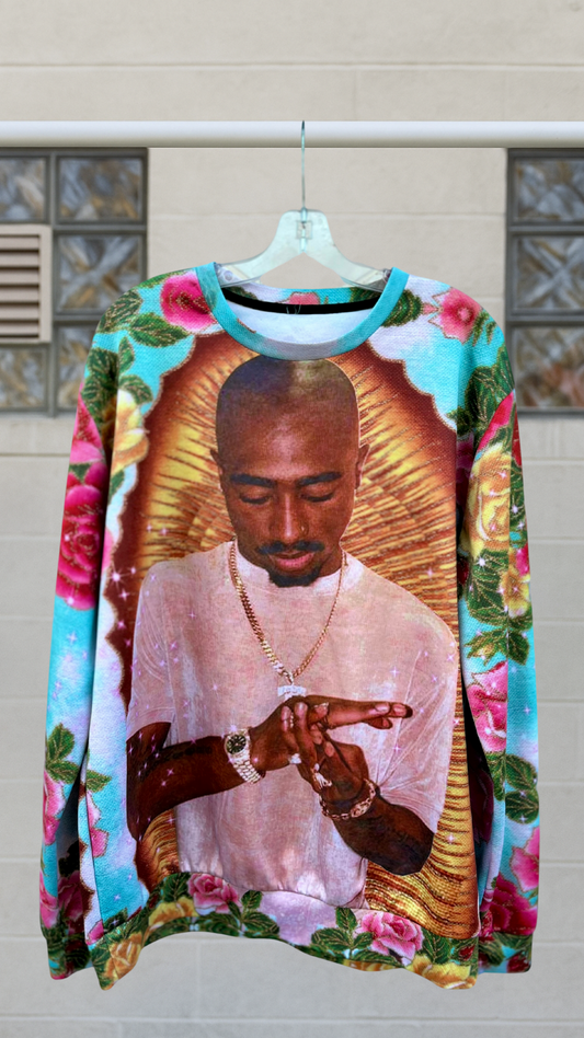 Colorful long-sleeve sweatshirt featuring central printed figure with floral and radiant gold design.