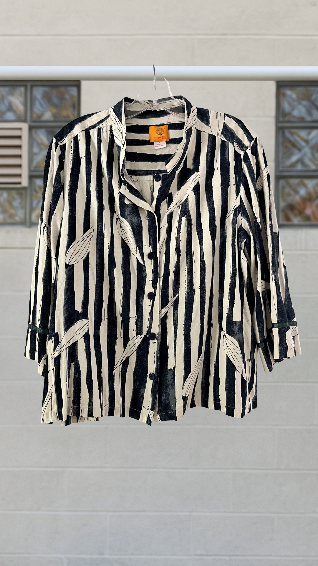navy striped silk blouse with feather motif and mandarin collar
