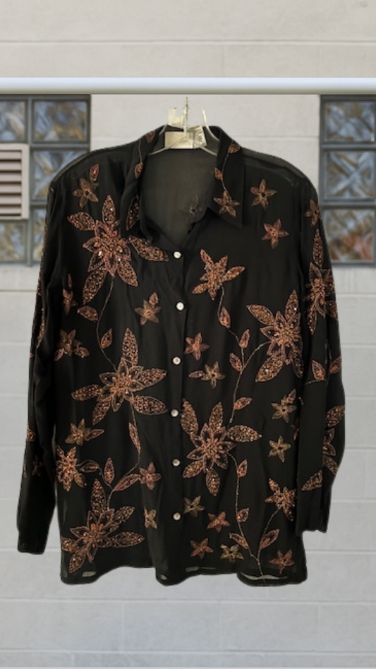 Sheer black button-down shirt with copper-toned floral sequin and bead embroidery, metallic thread accents, and side vents.
