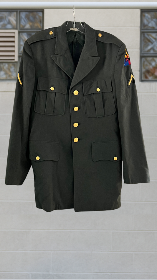 authentic army coat on a hanger against a white background