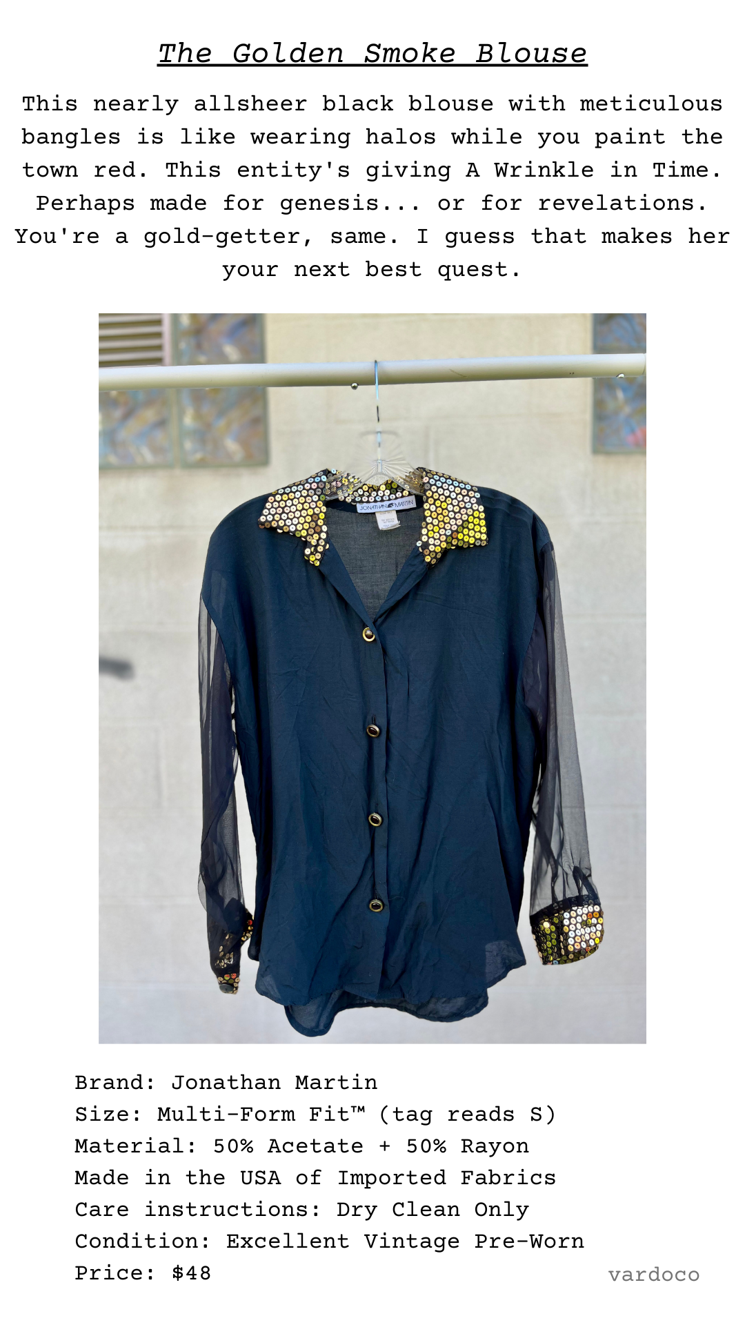 The Golden Smoke Blouse with sequined gold collar and cuffs, sheer sleeves, and decorative buttons, hanging against a neutral wall.
