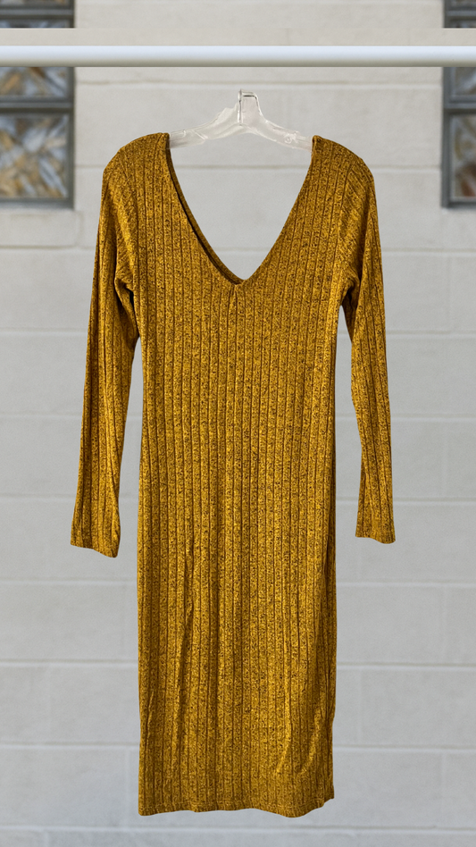 A long sleeve golden ribbed knit dress with a deep V neckline and calf length cut
