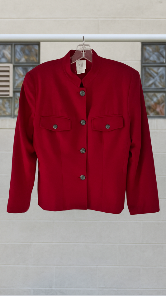 A tailored red wool-blend jacket with mandarin collar, button front, and structured silhouette
