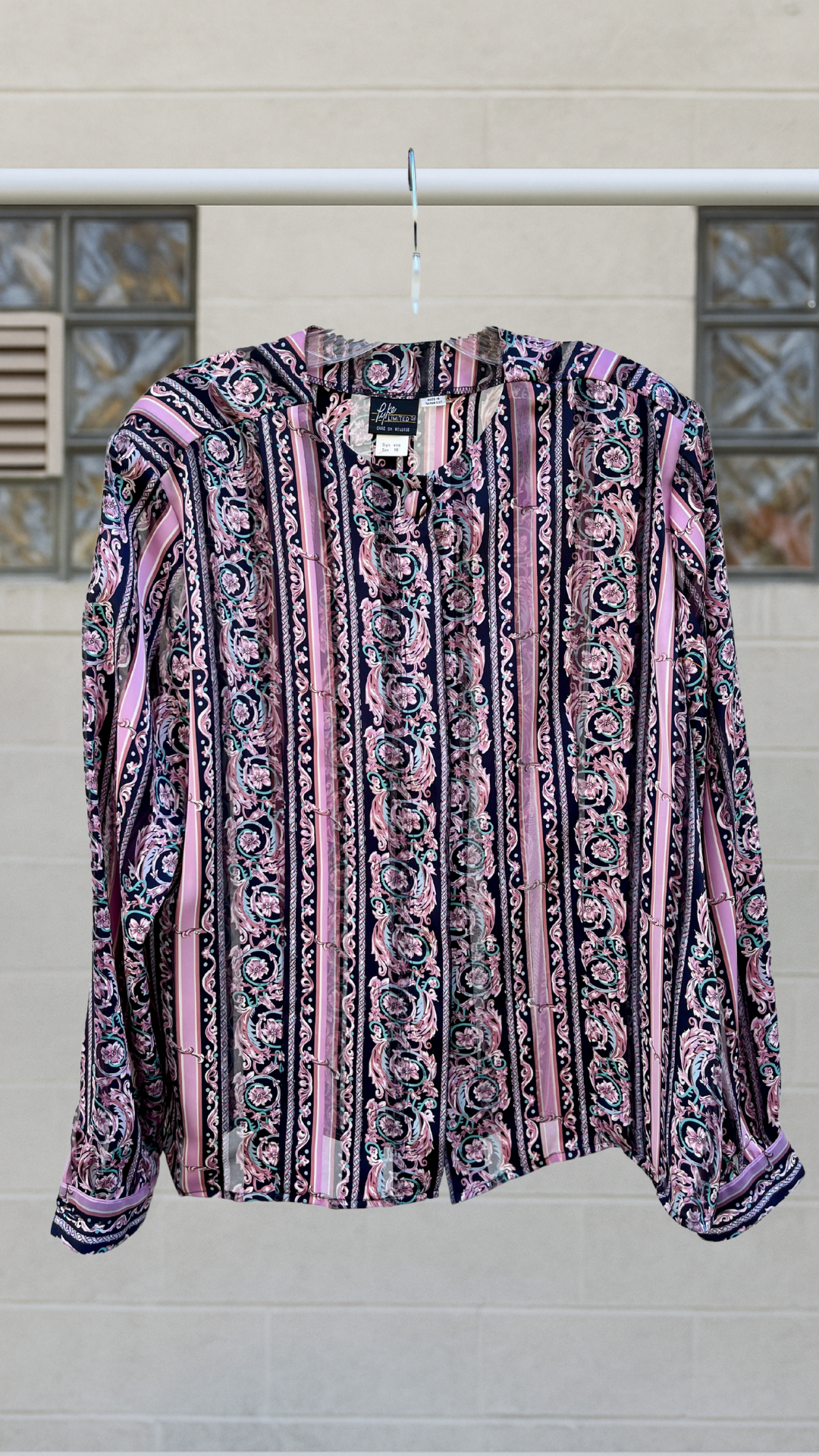 Vintage Pyke button-up blouse with vertical stripes in pink, black, and sage, featuring a tapestry-like pattern.