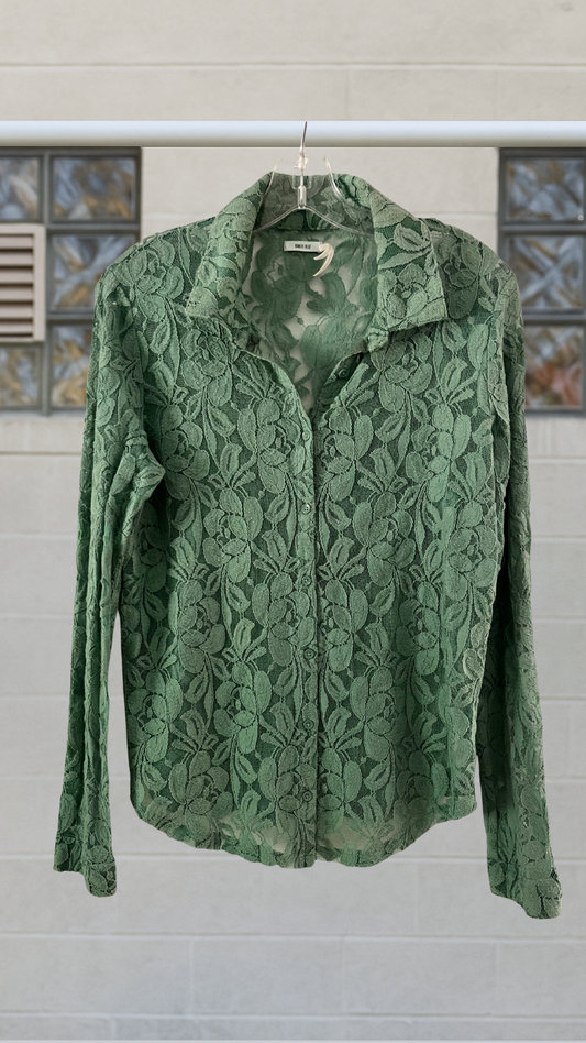 Green lace button-up shirt with floral overlay and sheer fabric.