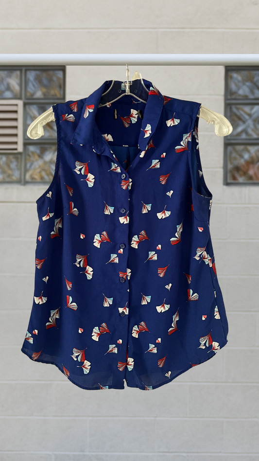 Sleeveless dark blue blouse with red and white ginkgo blossom print, button-front closure, and lightweight drape
