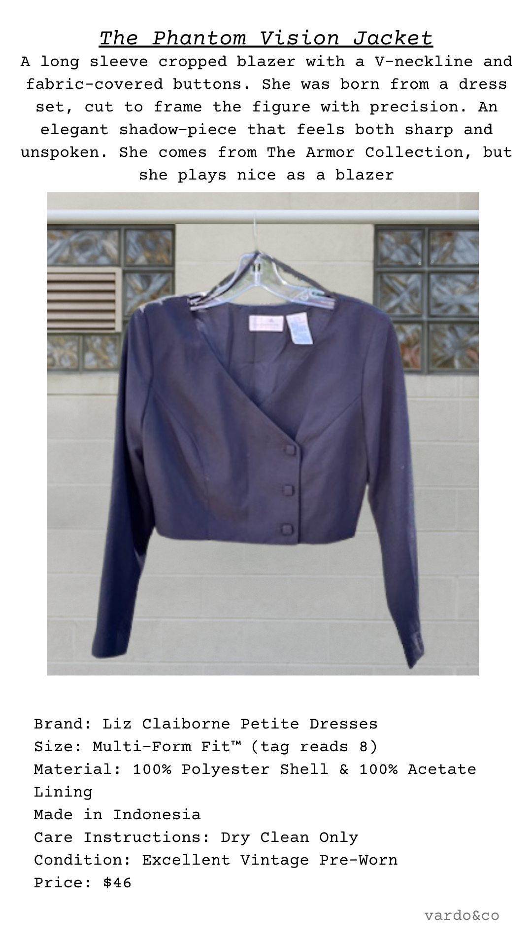 Vintage cropped blazer styled against light backdrop, highlighting side button closure.