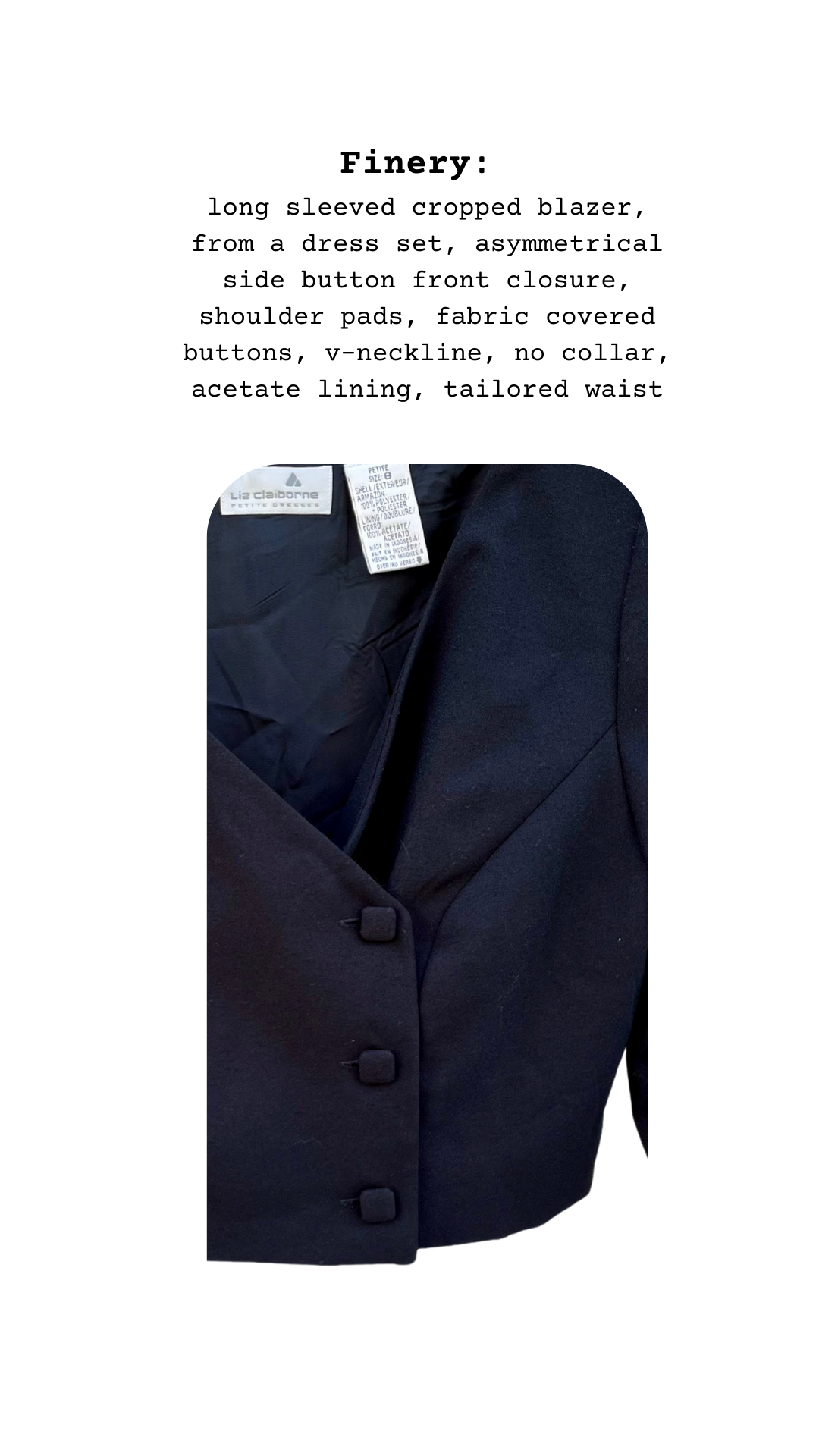 Dark inky blazer with v-neckline, no collar, fabric buttons, and tailored cropped fit.