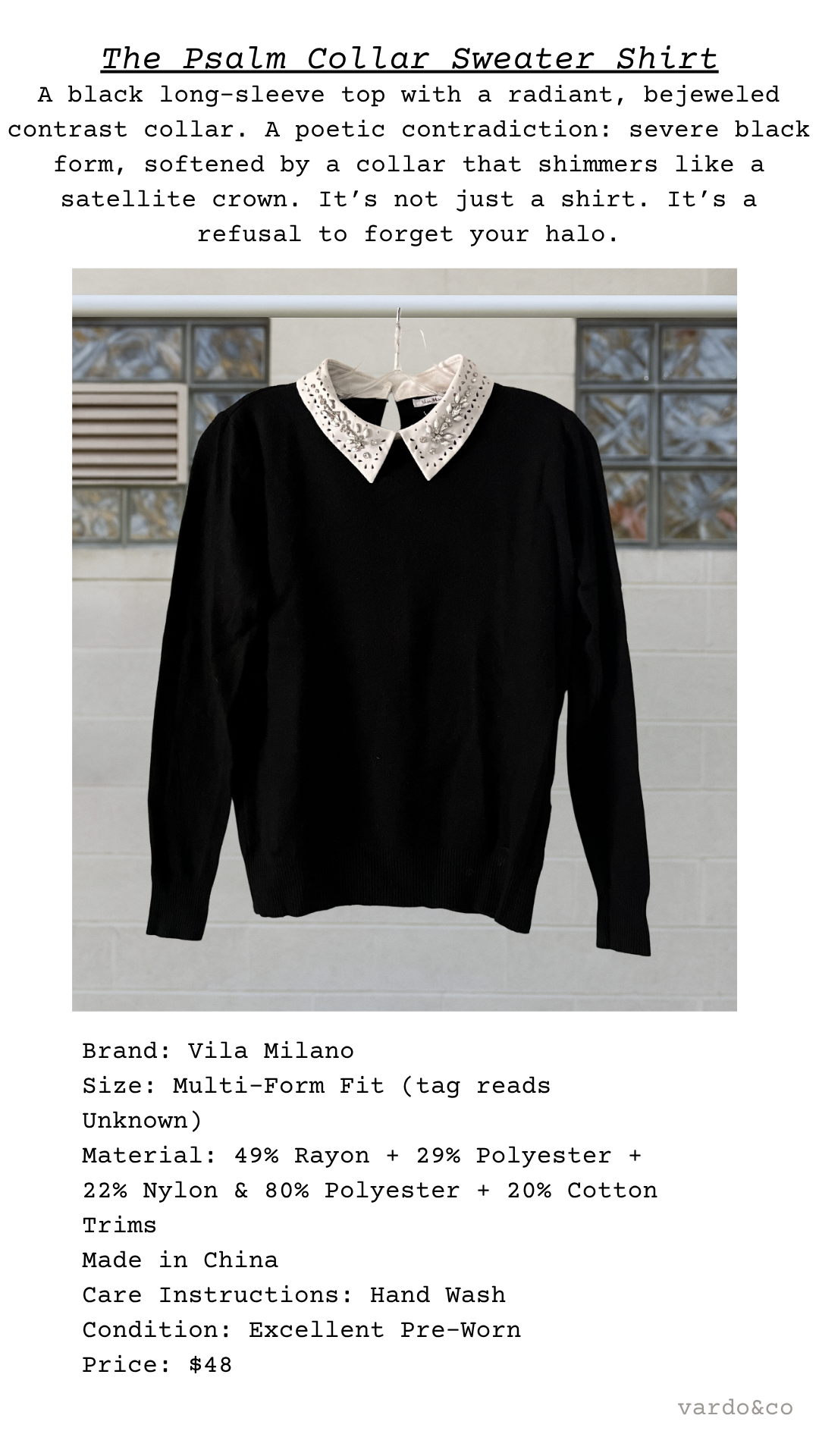 Flatlay of black sweater featuring a radiant white contrast collar embellished with jeweled beading and cutouts, labeled with poetic garment details.
