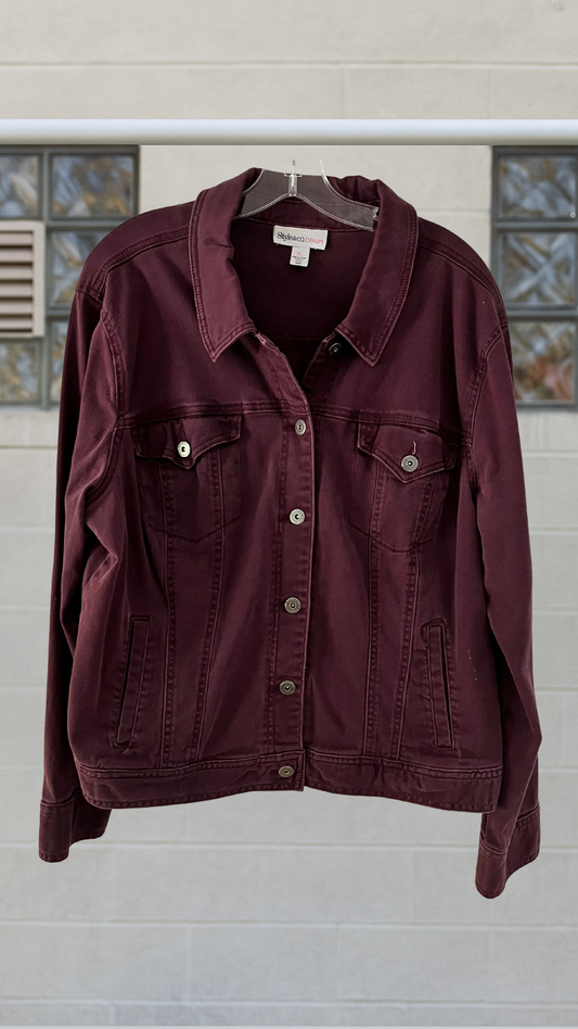 Purple denim jacket with button front and relaxed fit
