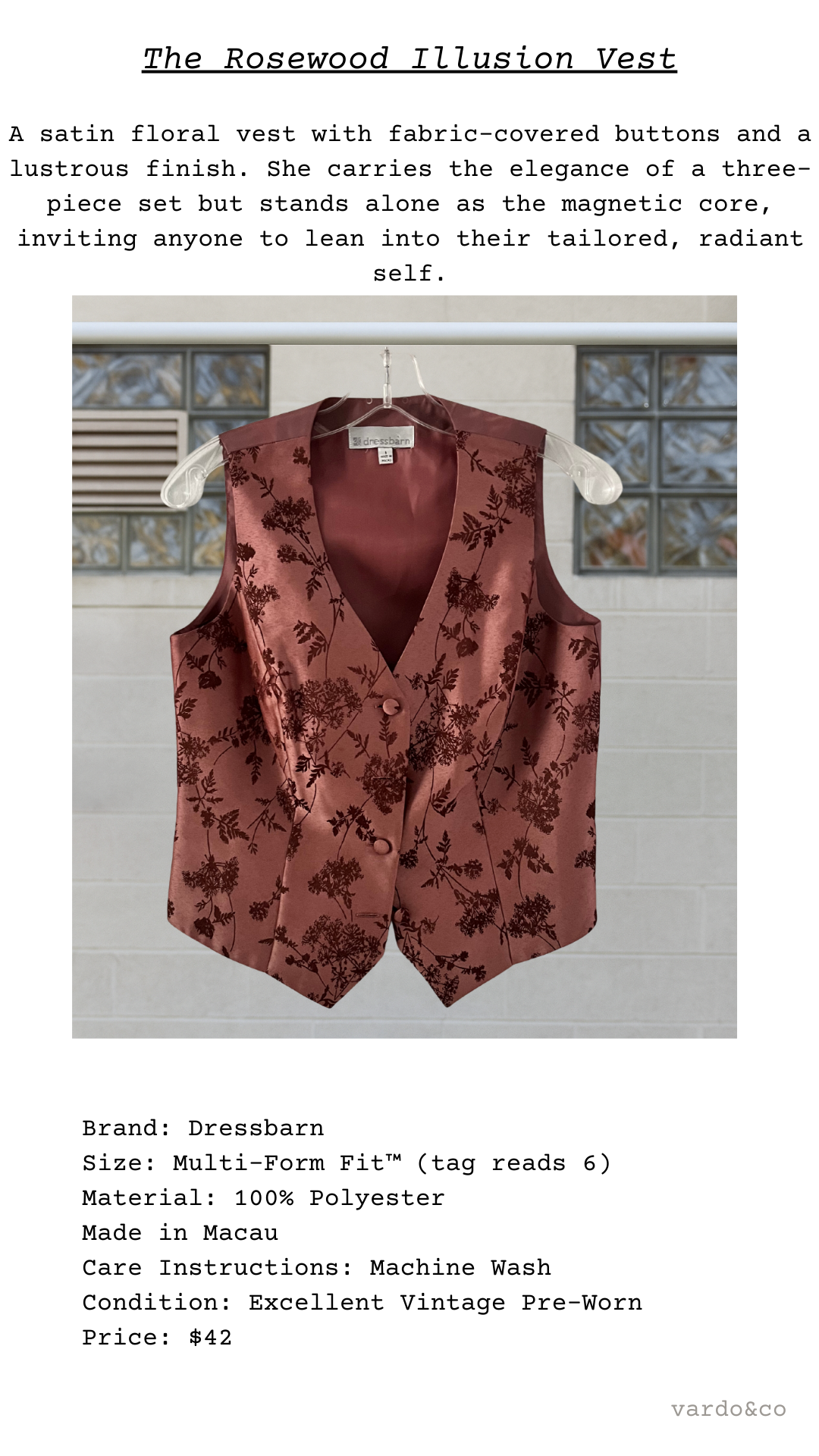 Purple floral satin vest on a hanger with text description and brand details.