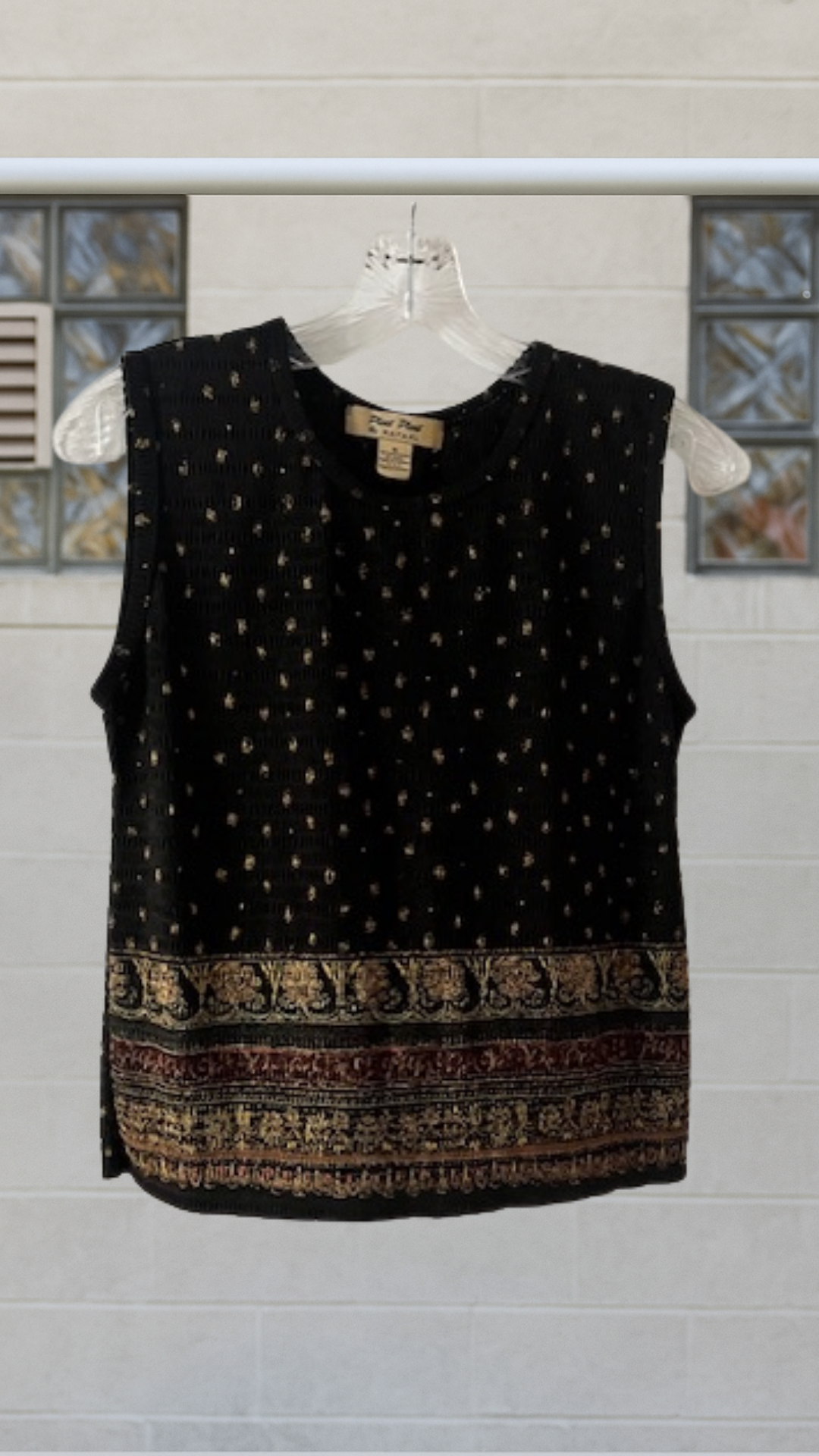 Sleeveless micro-pleated shell with celestial dot pattern and ornate border detailing
