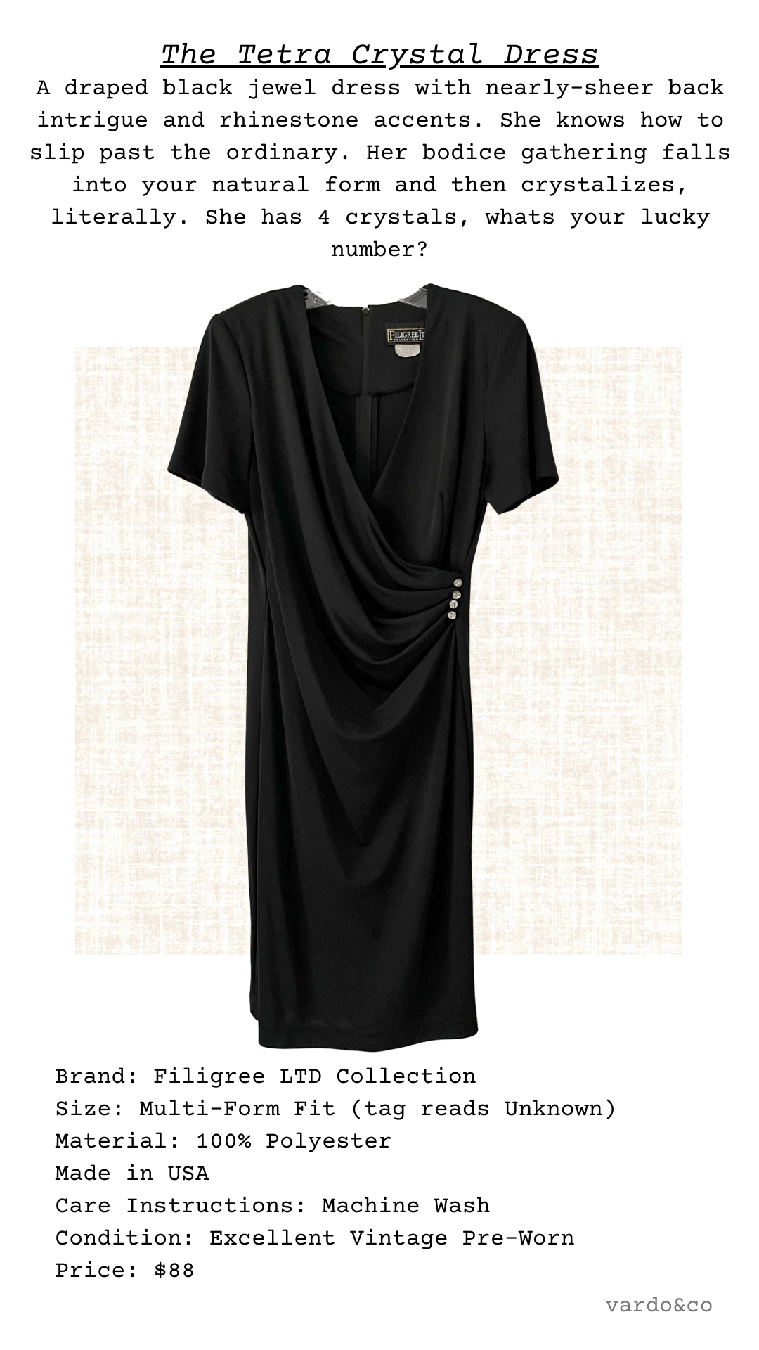 The Tetra Crystal Dress displayed with sleek drape and jeweled accents