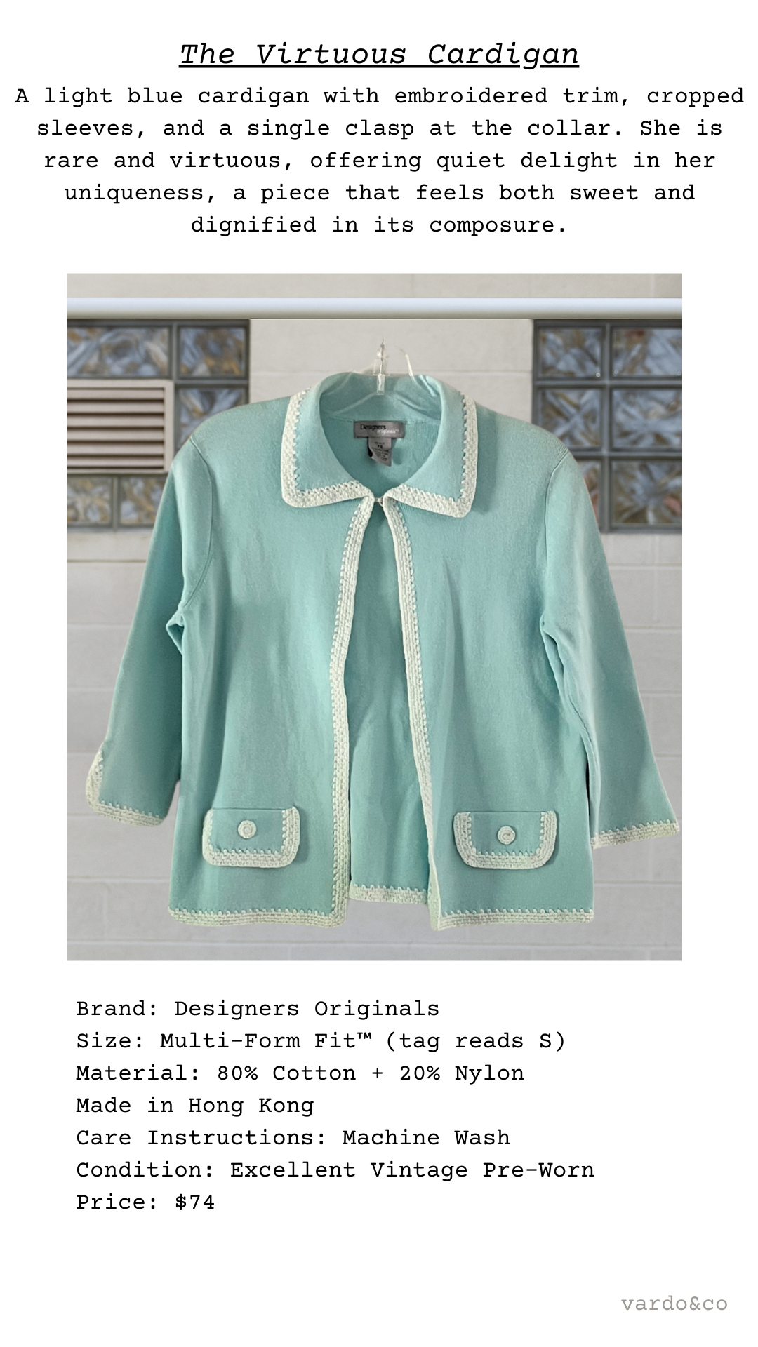 Light blue cardigan with embroidered trim on a white background