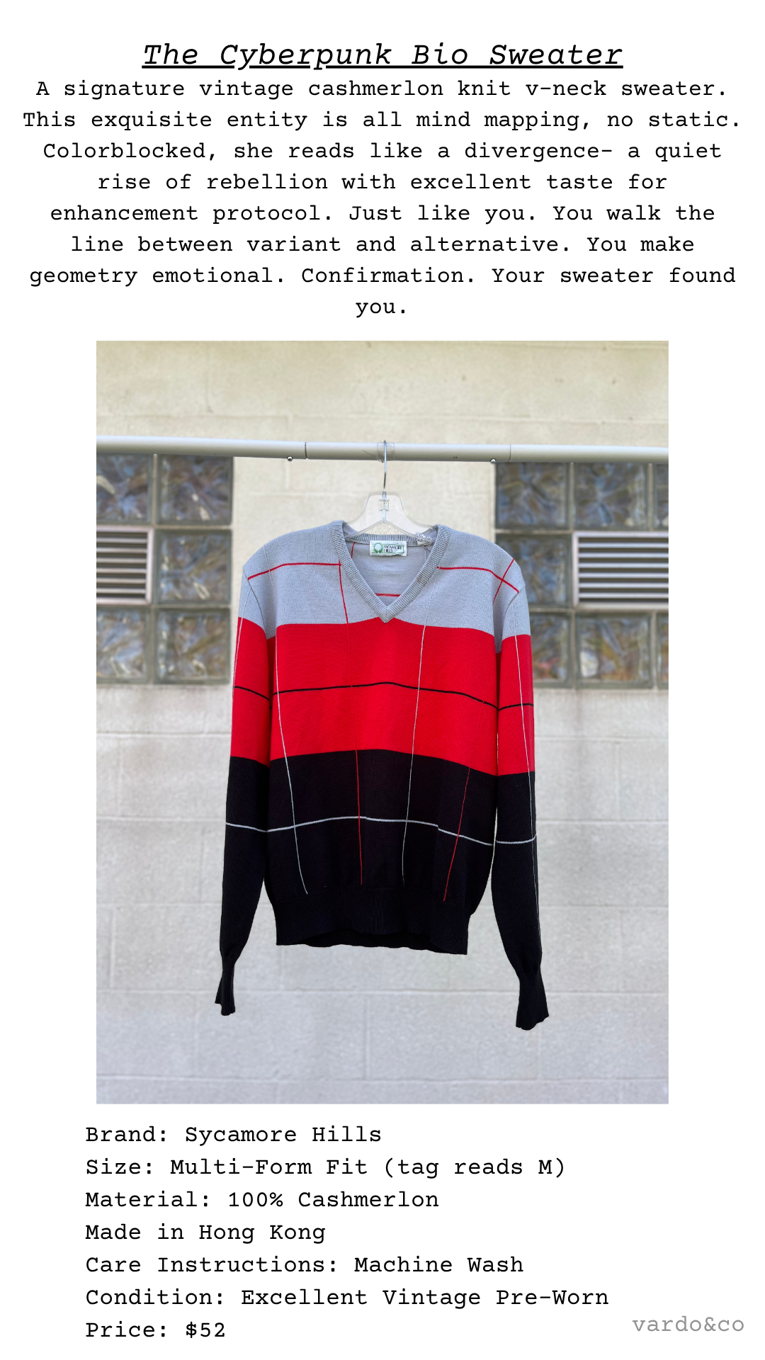 The Cyberpunk Bio Sweater shown full length on hanger, colorblocked in grayscale and red tones with a structured v-neck and tech-inspired silhouette
