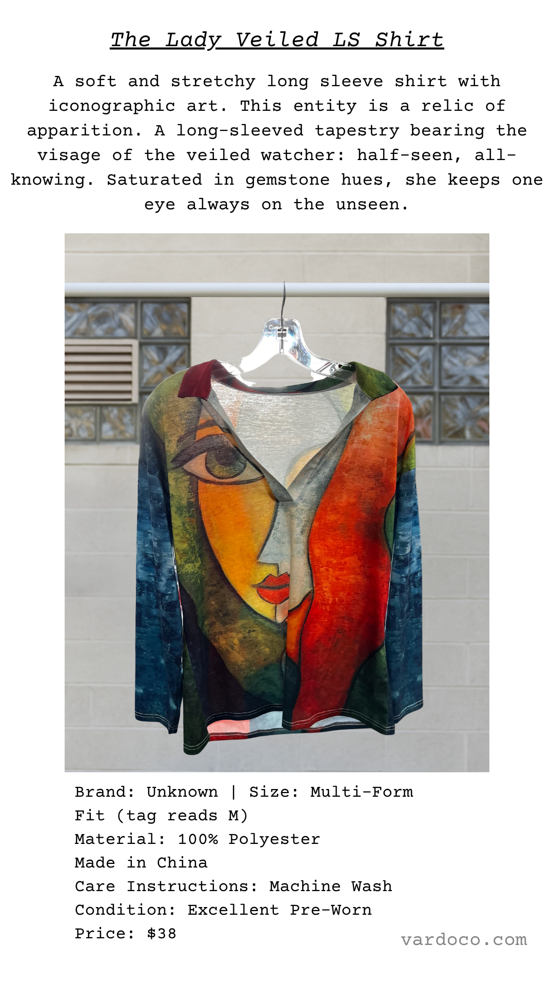 Stretchy artwear long sleeve top with iconographic design in gemstone hues, titled "The Lady Veiled"
