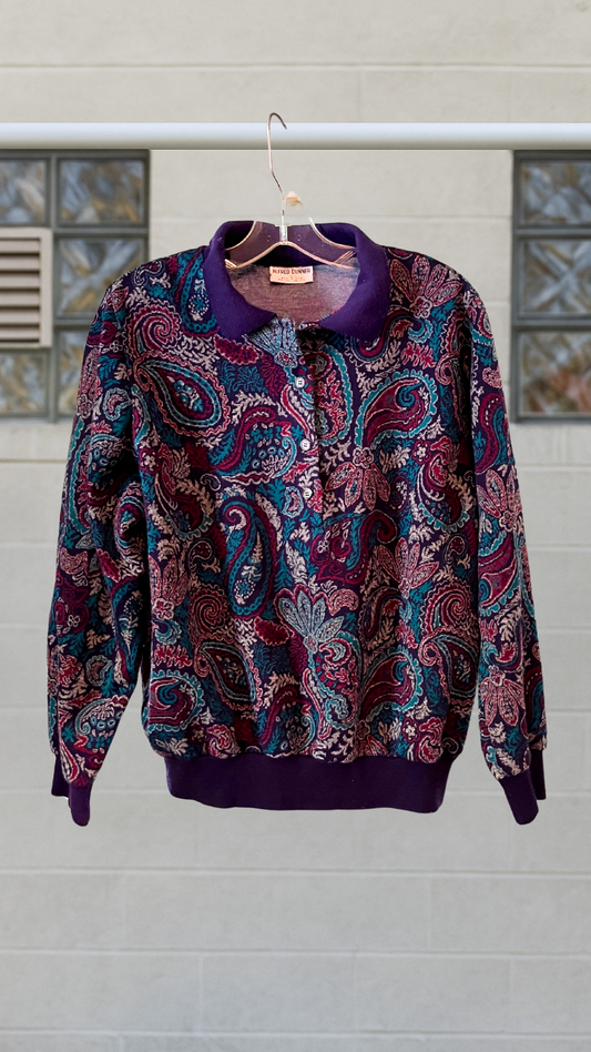 Vintage Alfred Dunner paisley sweater with purple collar and cuffs, shoulder pads, and four plastic buttons.